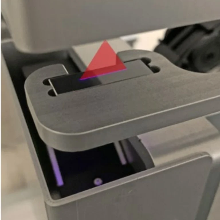 Official application photograph from the manufacturer datasheet: measuring head and laser on a test part; it does not show the complete system. 200/400/600 mm models vary in travel width
