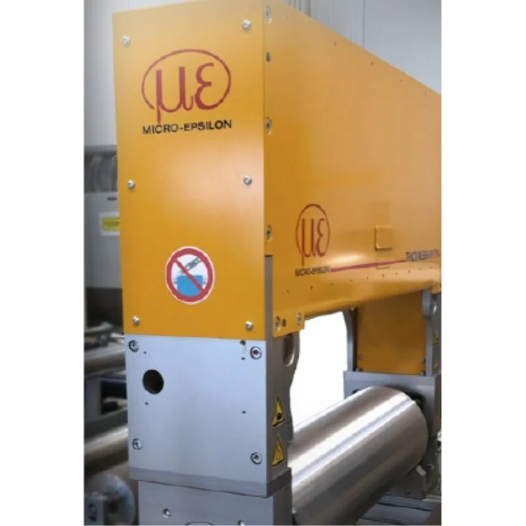 Manufacturer photograph of a thicknessGAUGE O.EC system in an operating environment; representative family configuration