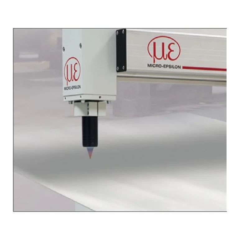 Manufacturer photo of a confocal-sensor installation from the thicknessCONTROL STG 8102.K family