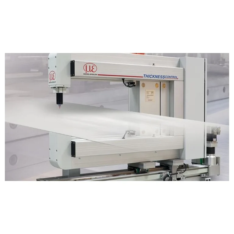 Manufacturer photo of a thicknessCONTROL STG 8102 C-frame system; sensor arrangement and measuring width vary by model